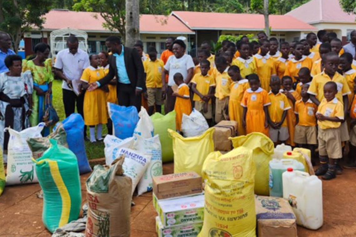 The King of Buganda, Ronald Muwenda Mutebi II, donates to the school for the deaf and blind