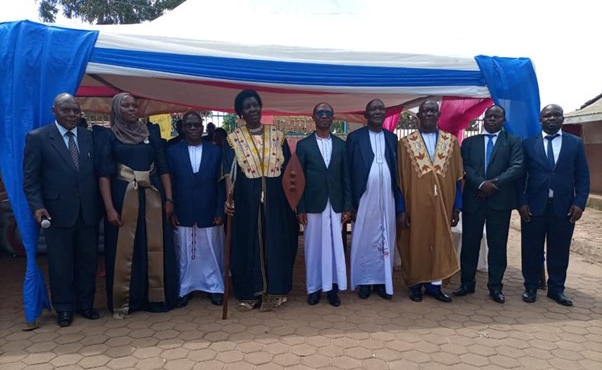 Hon. Nakiyingi Jane Bakalikwira crowned with her council members, commemorated in a joint photo with Hon. Joseph Kawuki.