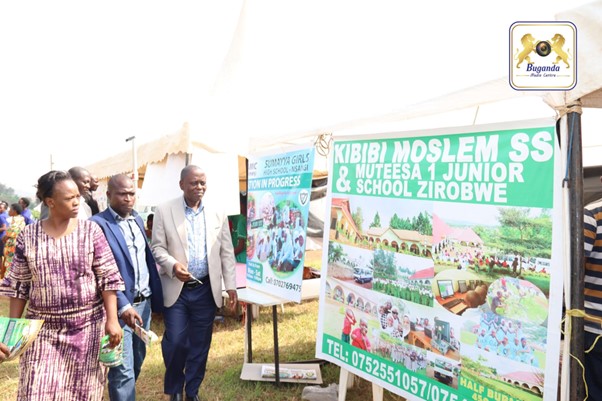 Hon. Anthony Wamala (right )with other officials touring different schools by visiting 