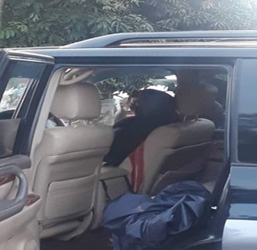 Omutaka  Lwomwa's dead body in the car after being shot 