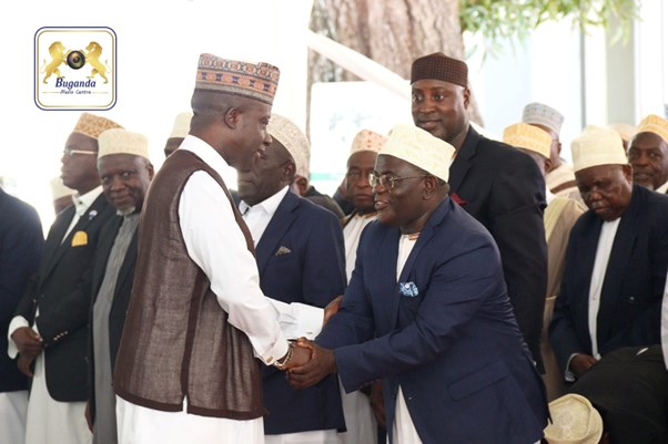 Prince (left) warmly welcomed the Deputy Katikkiro Hajji Twaha Kigongo Kawaase