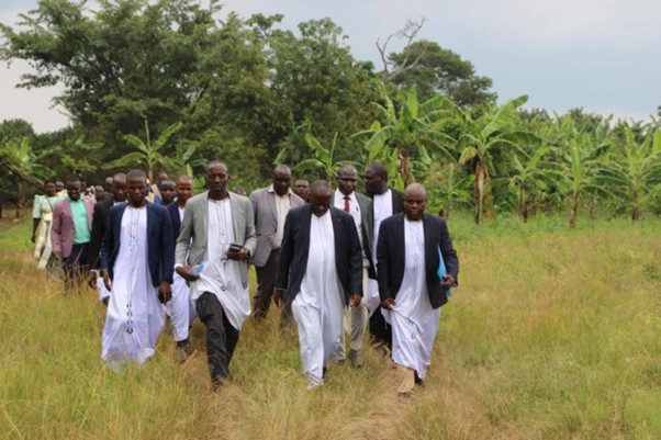 Hon. Dr. Anthony Wamala, visiting one of the clan's homelands with the Abalangira of Ekibulala and Ekiwere clans in Ssingo. Image